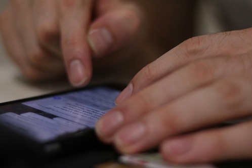 Customer reading a text message